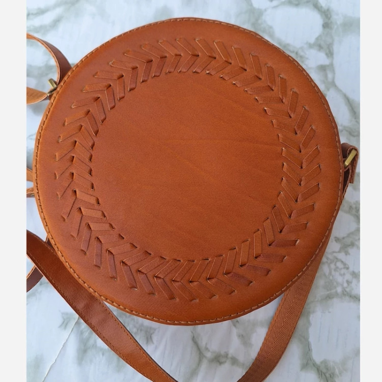 کیف چرم طبیعی مدل گرد یا دایره ای